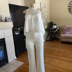 White sexy jumpsuit size small runs small